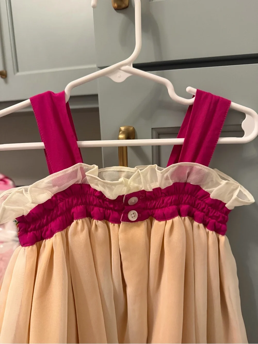 Well Dressed Wolf Cream Chiffon Dress with Pink Straps and Teal & Orange Ribbons